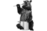 Un orso mangia da una pentola