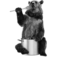 Un orso mangia da una pentola
