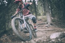 Close-up of a biker in the forest