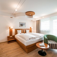 Double room Mountain with a wooden floor